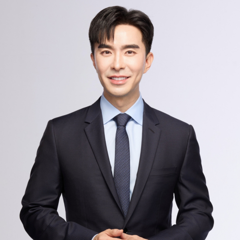 Headshot of Dr. Dissapong Panithaporn, a dermatologist and the Co-Founder of The Demis Clinic